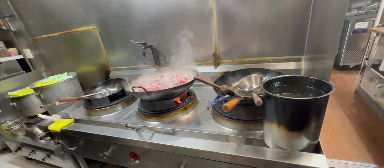 Wok cooking in the Pho Heaven kitchen